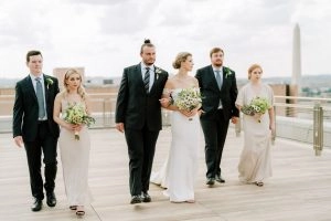 classic wedding bridal party looks champagne and black