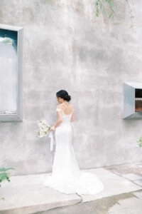 silk satin wedding dress buttons down the back off the shoulder