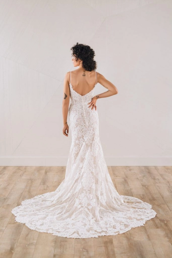 Back of bride wearing beaded art deco wedding dress with thin straps