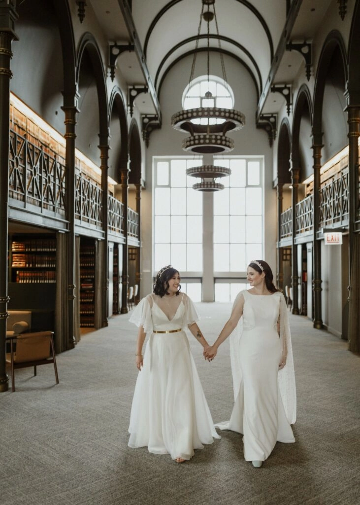 two brides in library wedding venue